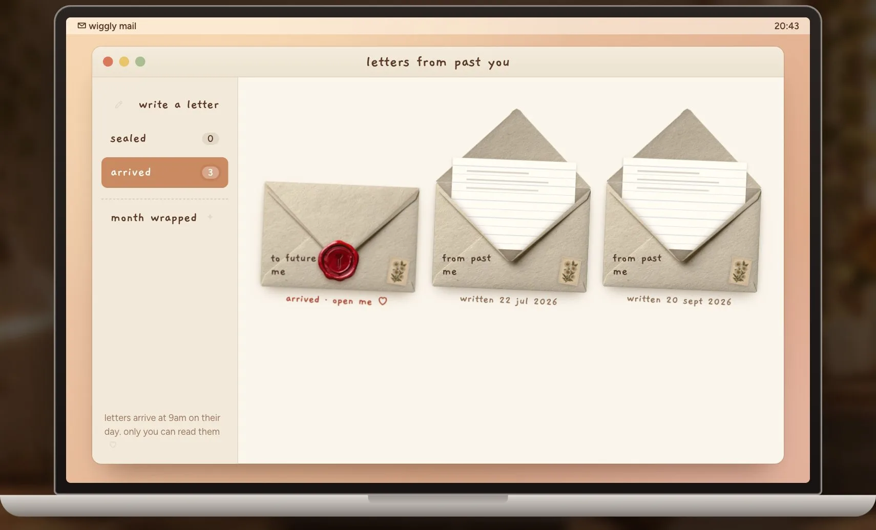 The laptop in the Wiggly room showing letters from past you: one sealed with red wax, two opened with the letter peeking out