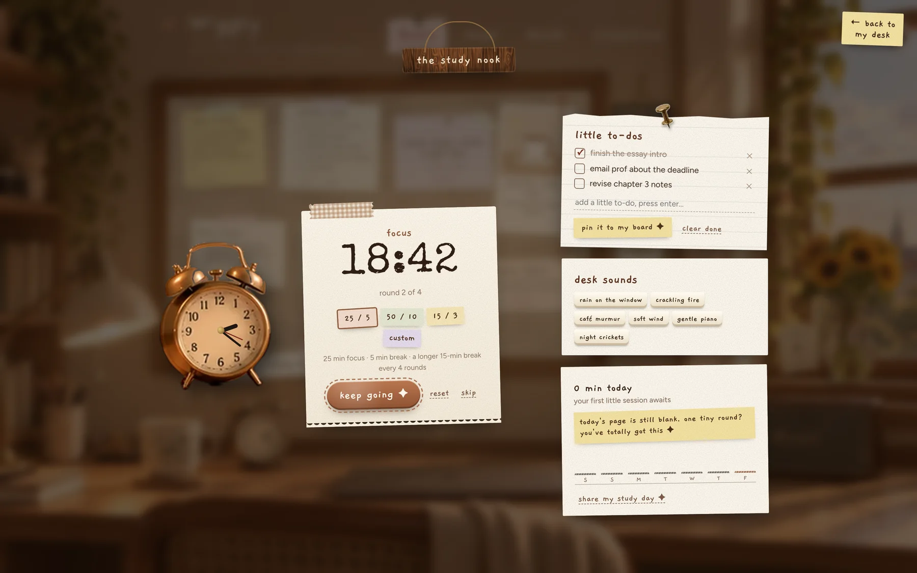 The Wiggly study nook: a brass alarm clock showing the timer, a to-do card and a study log on a cozy desk